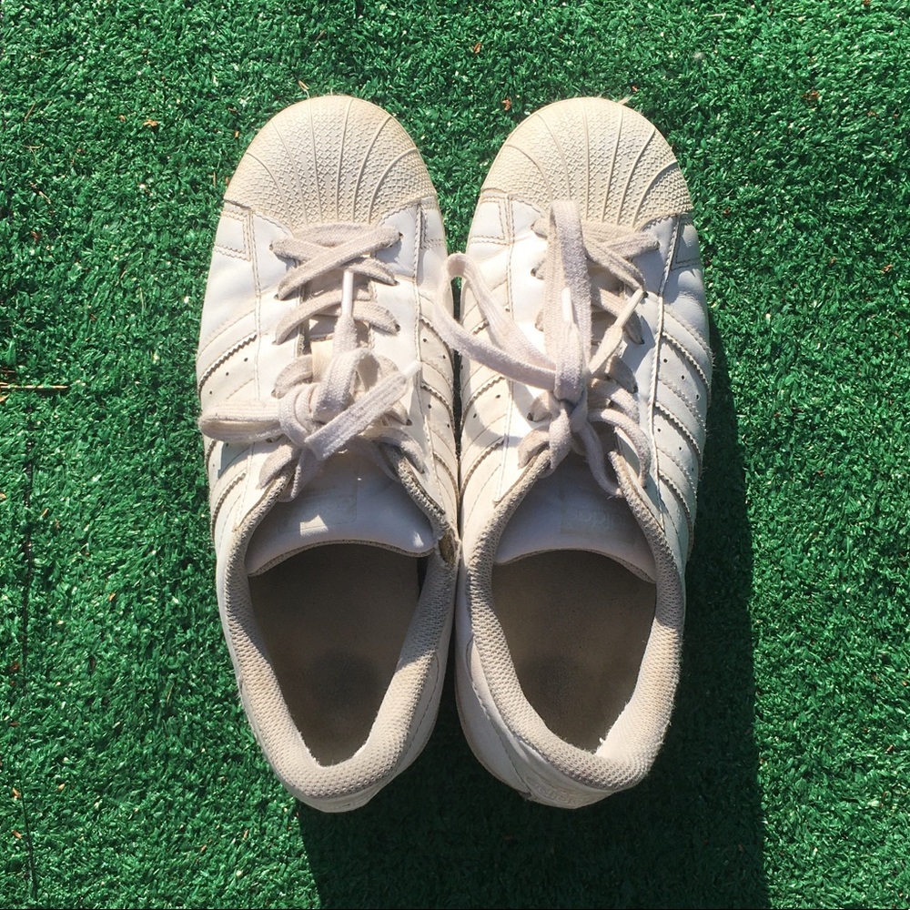 All white adidas superstars